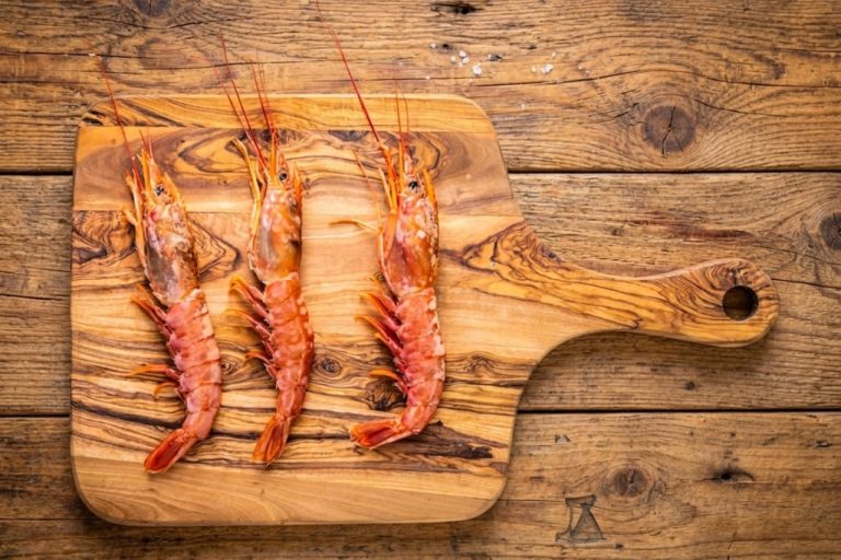 Humbled Restaurant Prawns on a wooden chopping board